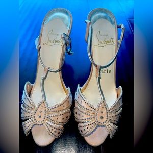 Christian Louboutin beige red bottom stilettos with crystals and strap.